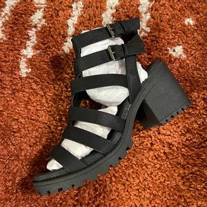Never worn black heeled sandals